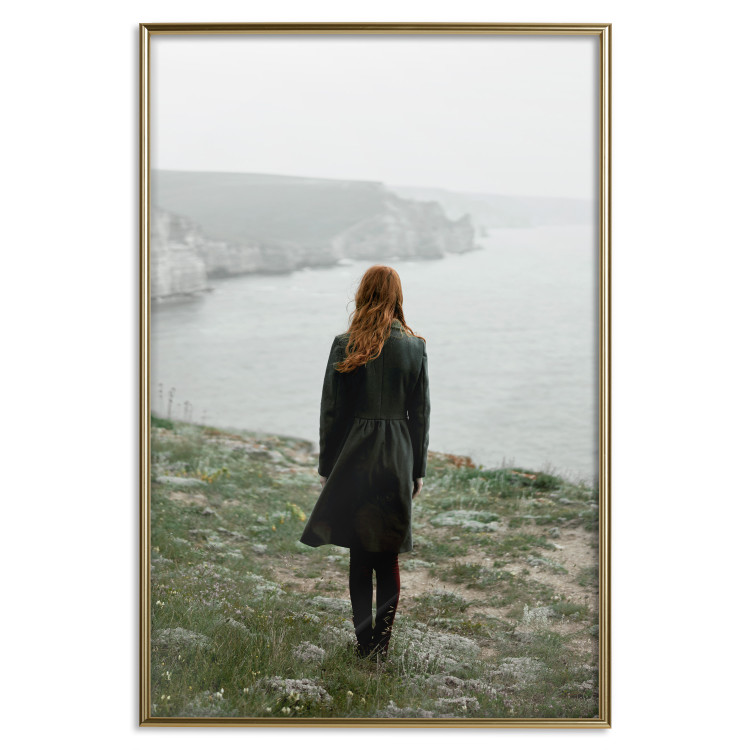 Wall Poster What Now? - landscape of a woman dressed in green against the sea and rocks 130295 additionalImage 26