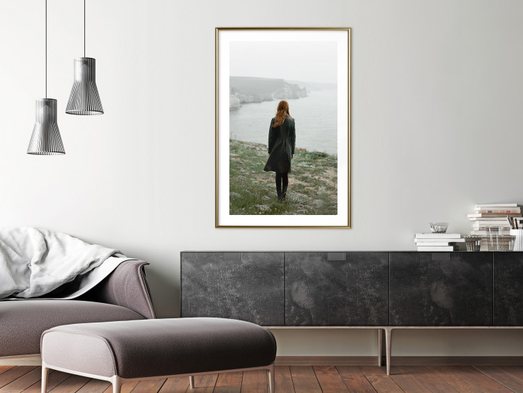 Wall Poster What Now? - landscape of a woman dressed in green against the sea and rocks 130295 additionalImage 15