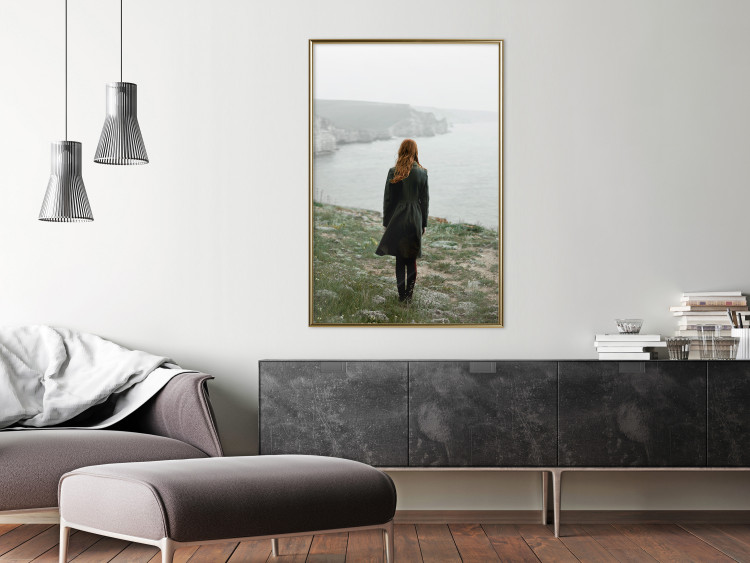 Wall Poster What Now? - landscape of a woman dressed in green against the sea and rocks 130295 additionalImage 7