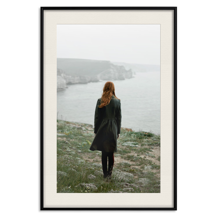 Wall Poster What Now? - landscape of a woman dressed in green against the sea and rocks 130295 additionalImage 23