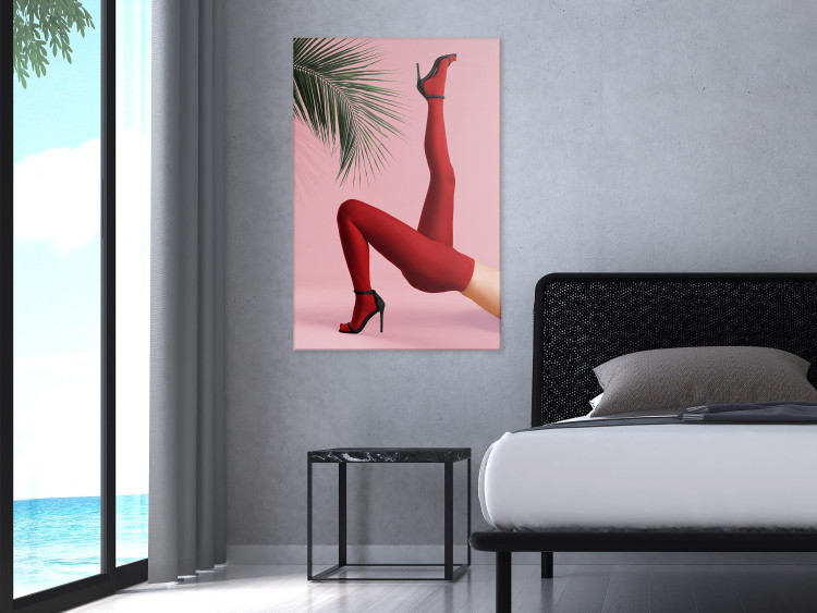 Canvas Print Red Tights (1-piece) - female legs against a green palm tree background 144116 additionalImage 3