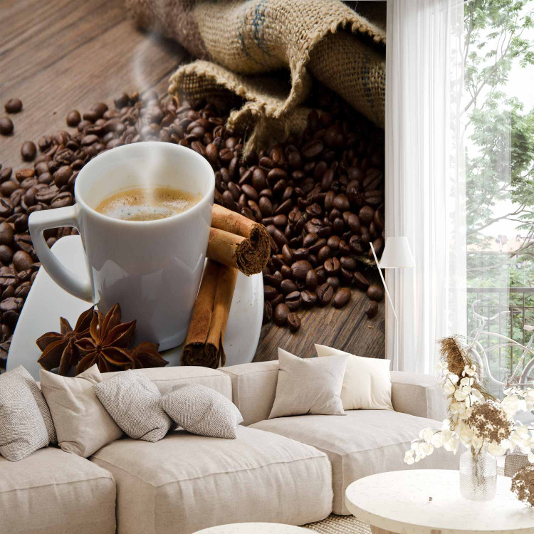 Wall Mural Morning - Cup of Hot Coffee on a Brown Background with Spices 59816