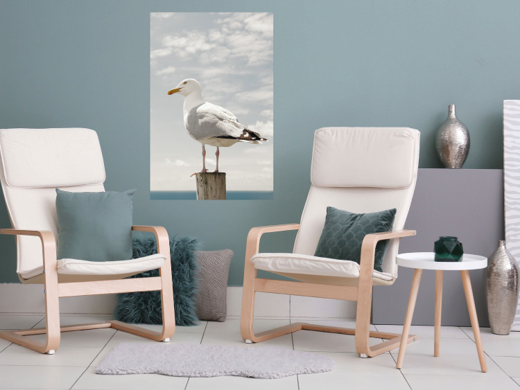 Wall Poster Seagull - water bird sitting on a pier with sea and cloudy sky in the background 117026 additionalImage 17