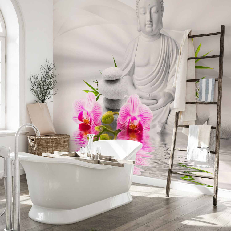 Wall Mural Buddhism - Meditating Buddha on a water surface with orchids on a white background 61426 additionalImage 8