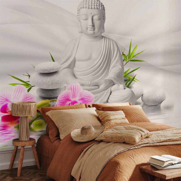 Wall Mural Buddhism - Meditating Buddha on a water surface with orchids on a white background 61426 additionalImage 2