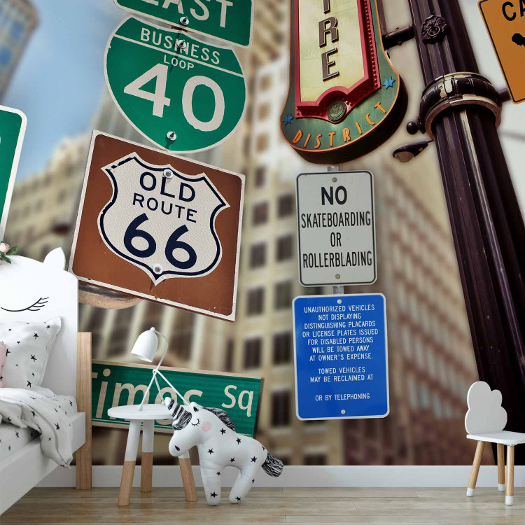 Wall Mural New York USA - composition of road signs on an architectural background 96826 additionalImage 4