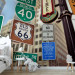 Wall Mural New York USA - composition of road signs on an architectural background 96826 additionalThumb 4