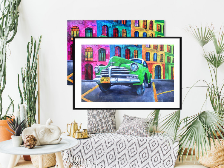 Poster American Classic - green car against a background of colorful architecture 126536 additionalImage 23