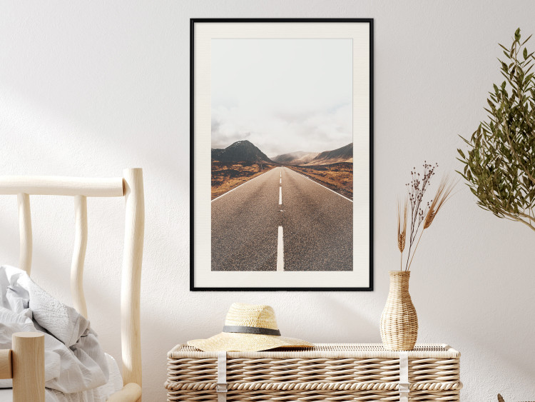 Wall Poster Ahead - landscape of a road amidst yellow and black fields and mountains 130236 additionalImage 23