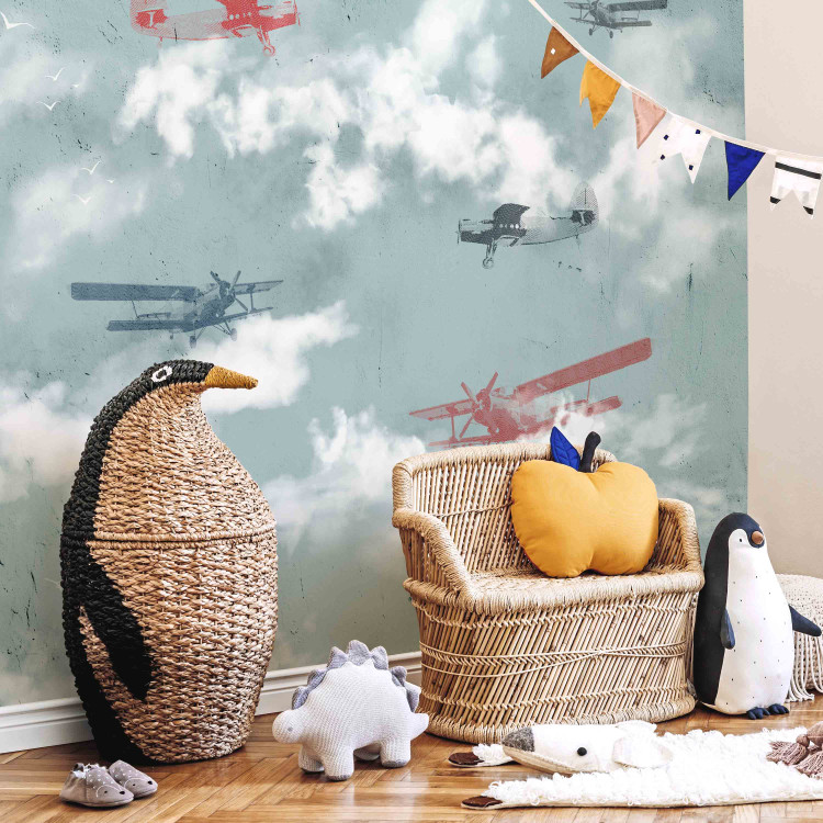 Wall Mural Dream of a little pilot - planes in the sky with clouds and birds for children 143036 additionalImage 6