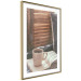 Wall Poster Mug of Memories - open book with tea against wooden doors 124456 additionalThumb 8