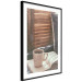 Wall Poster Mug of Memories - open book with tea against wooden doors 124456 additionalThumb 11