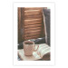 Wall Poster Mug of Memories - open book with tea against wooden doors 124456 additionalThumb 19