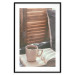 Wall Poster Mug of Memories - open book with tea against wooden doors 124456 additionalThumb 17