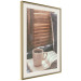 Wall Poster Mug of Memories - open book with tea against wooden doors 124456 additionalThumb 2