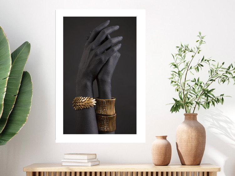 Wall Poster Exotic Duet - black hands with golden accents on a dark background 130456 additionalImage 5