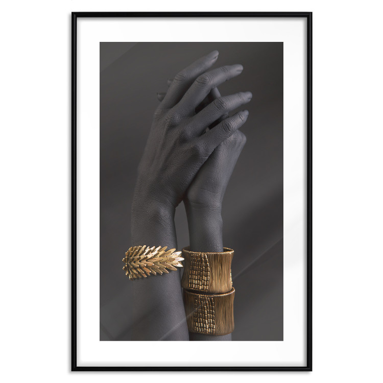 Wall Poster Exotic Duet - black hands with golden accents on a dark background 130456 additionalImage 17