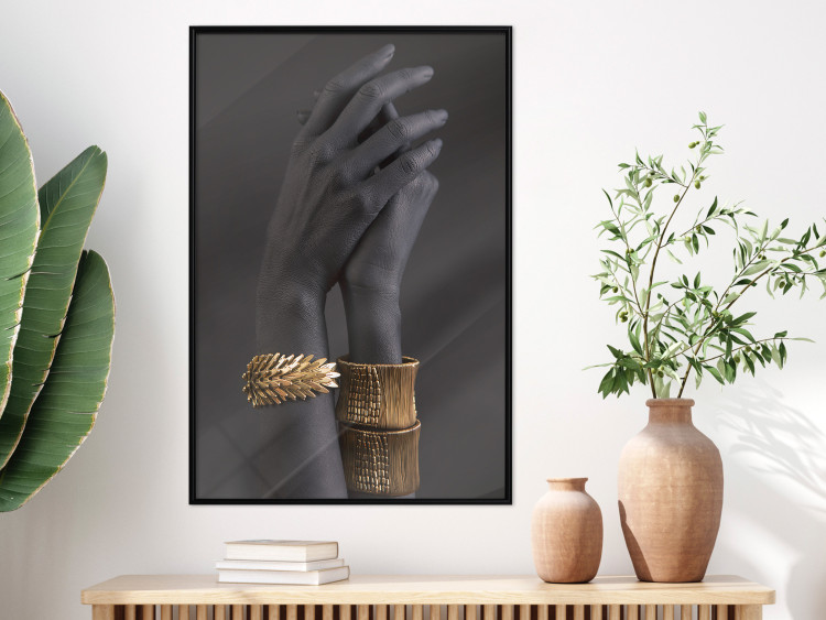 Wall Poster Exotic Duet - black hands with golden accents on a dark background 130456 additionalImage 6