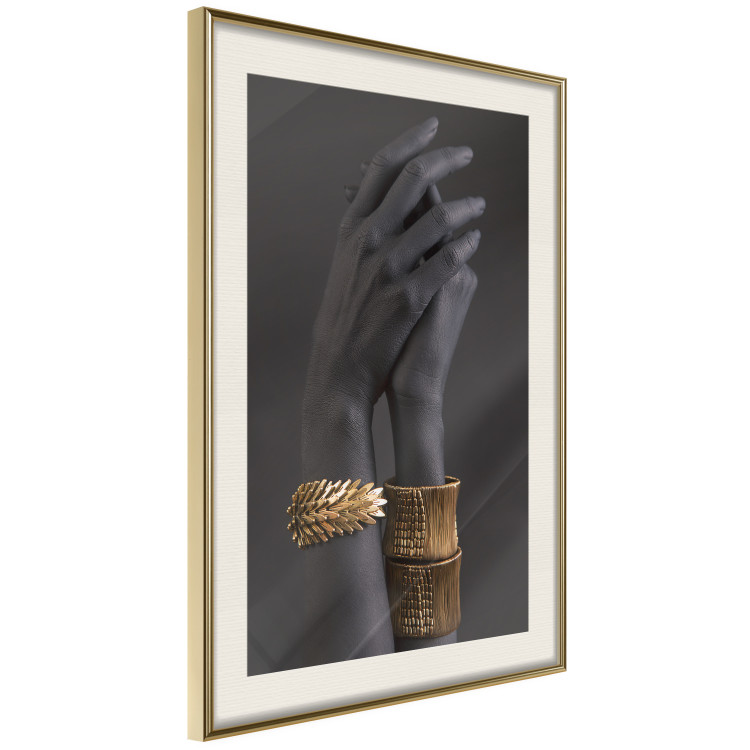 Wall Poster Exotic Duet - black hands with golden accents on a dark background 130456 additionalImage 3