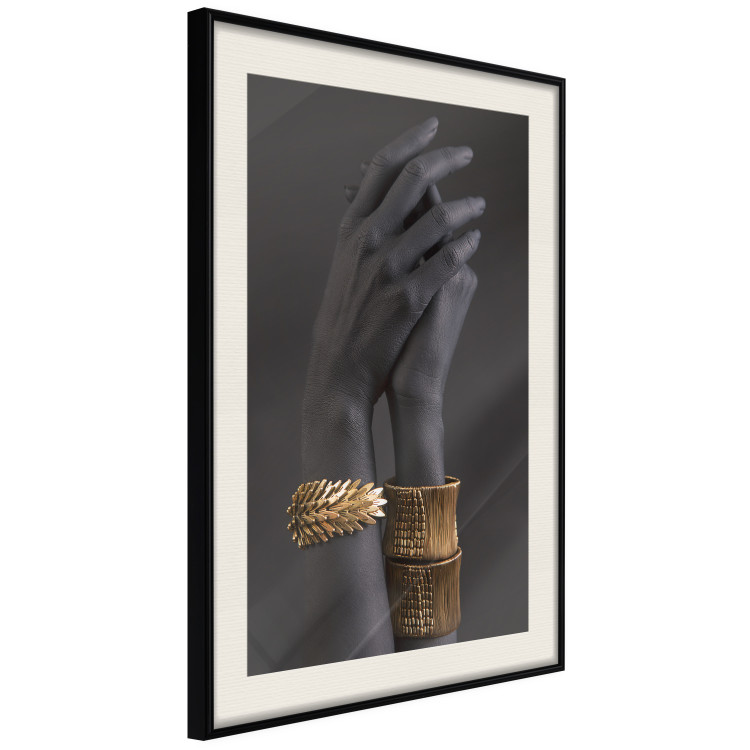 Wall Poster Exotic Duet - black hands with golden accents on a dark background 130456 additionalImage 2