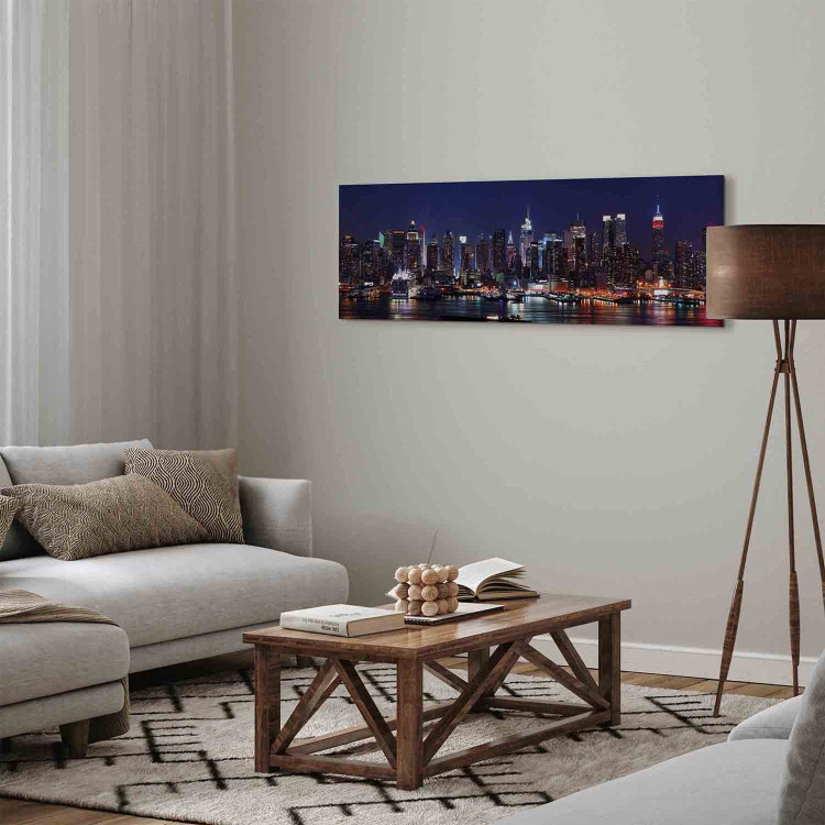 Canvas Print Nightlife (1-piece) - New York City skyline and skyscrapers over calm water 149076 additionalImage 3