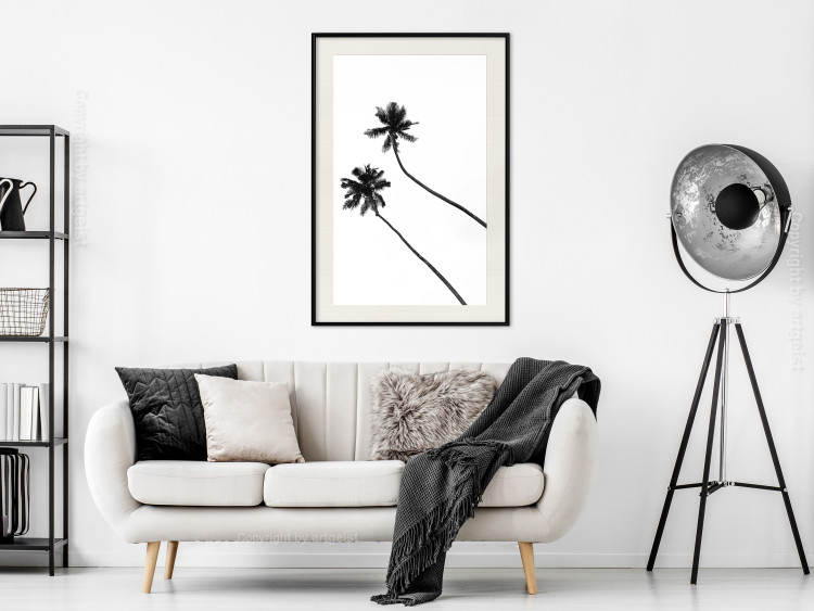 Poster Solitary Palms - black tropical trees on a contrasting white background 129786 additionalImage 24