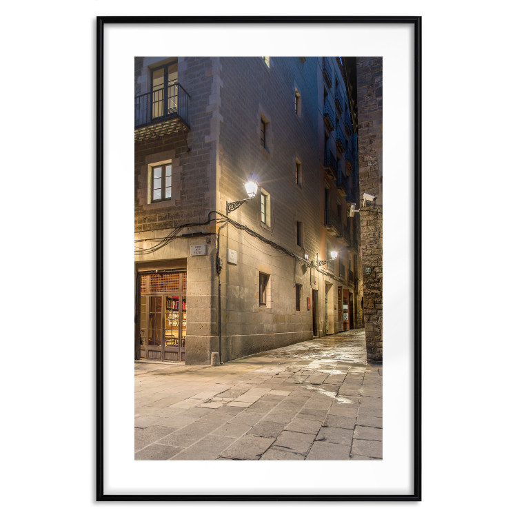 Poster Charming Alley - illuminated architecture of stone buildings at night 123617 additionalImage 15