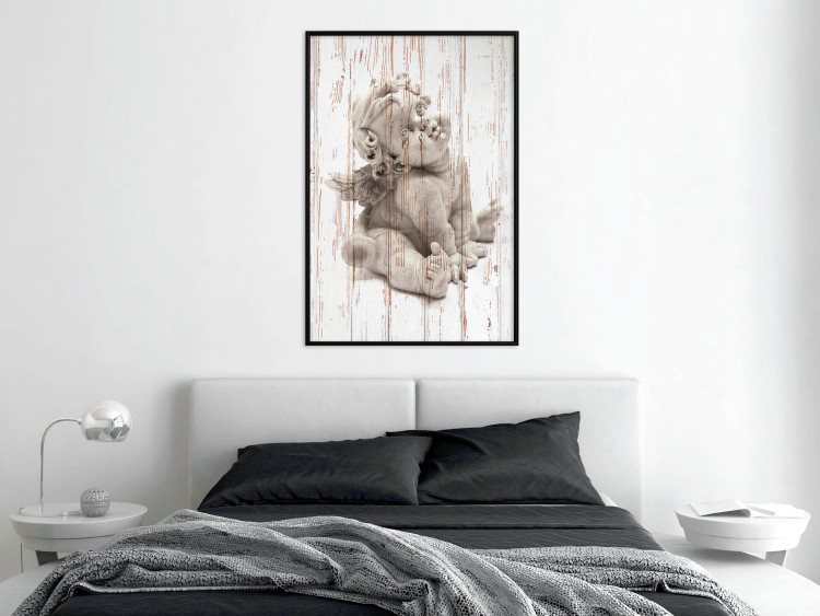Wall Poster Contemplative Love - stone sculpture of an angel on a wooden texture background 125227 additionalImage 3