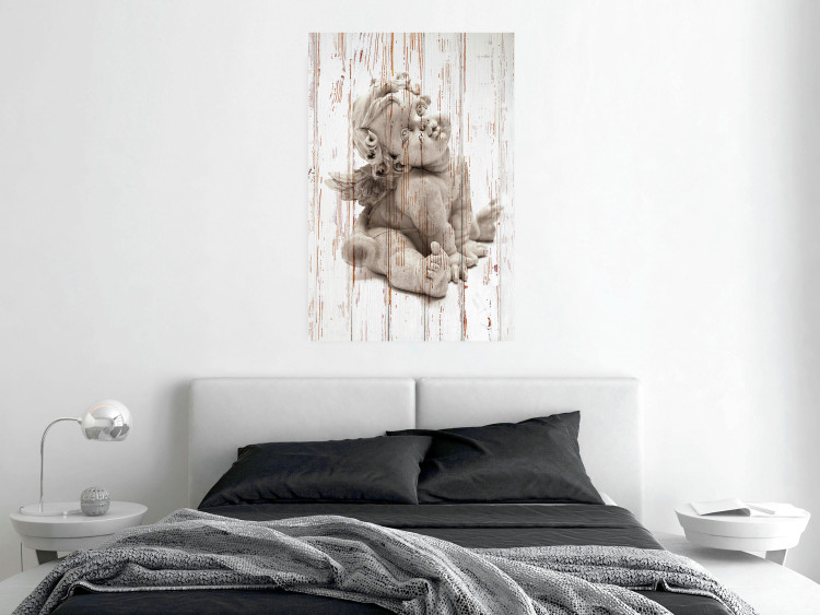 Wall Poster Contemplative Love - stone sculpture of an angel on a wooden texture background 125227 additionalImage 23