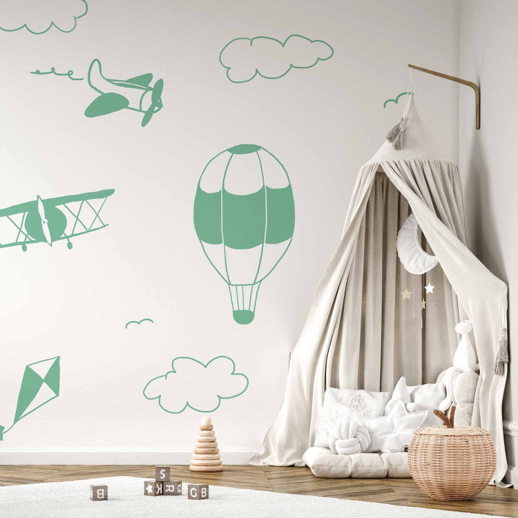 Wall Mural Sky Flight - Drawn Planes on a Background of a Green Sky With Clouds 145147 additionalImage 6