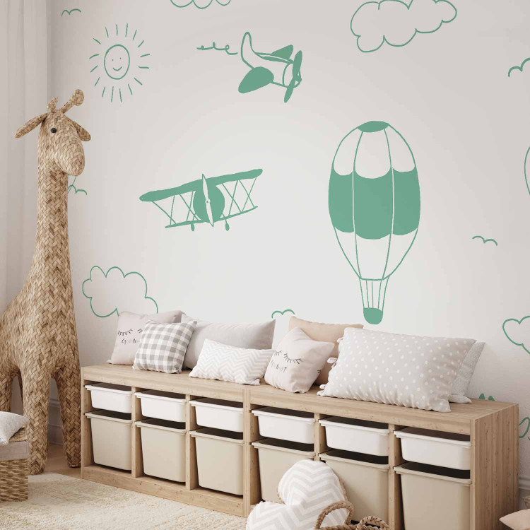 Wall Mural Sky Flight - Drawn Planes on a Background of a Green Sky With Clouds 145147 additionalImage 2