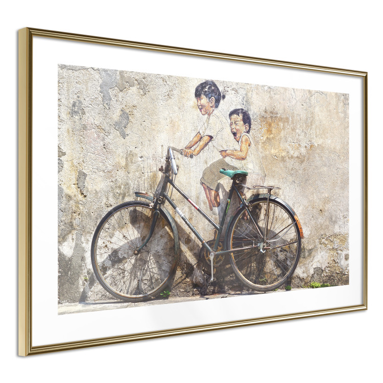 Poster Carefree - retro black bicycle against a wall painted with children 130457 additionalImage 11