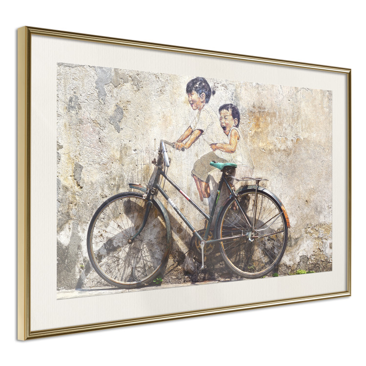 Poster Carefree - retro black bicycle against a wall painted with children 130457 additionalImage 7