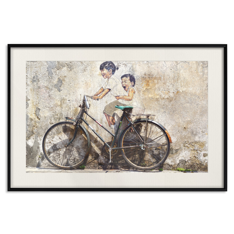 Poster Carefree - retro black bicycle against a wall painted with children 130457 additionalImage 19
