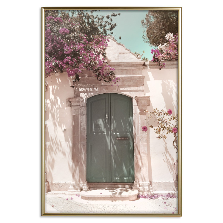Wall Poster Charming Alley - architecture of a wall with a green entrance in the sunlight 135757 additionalImage 16