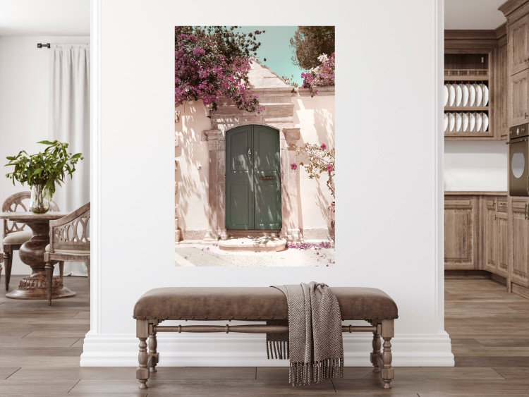 Wall Poster Charming Alley - architecture of a wall with a green entrance in the sunlight 135757 additionalImage 14
