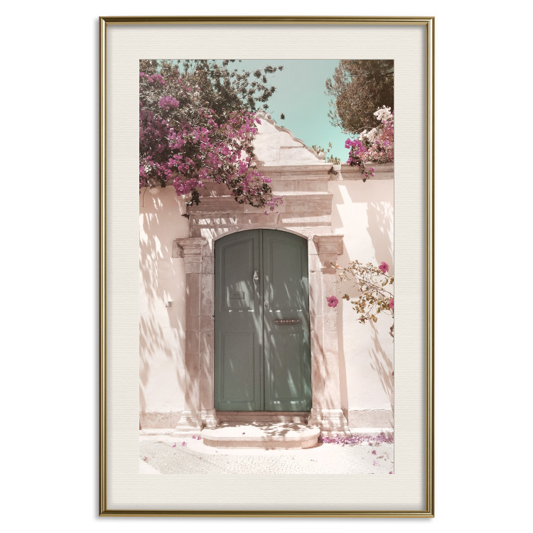 Wall Poster Charming Alley - architecture of a wall with a green entrance in the sunlight 135757 additionalImage 27