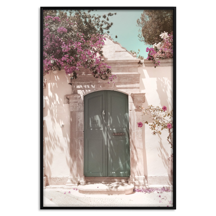 Wall Poster Charming Alley - architecture of a wall with a green entrance in the sunlight 135757 additionalImage 15