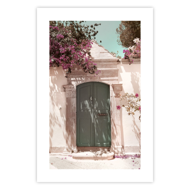 Wall Poster Charming Alley - architecture of a wall with a green entrance in the sunlight 135757 additionalImage 23