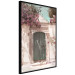 Wall Poster Charming Alley - architecture of a wall with a green entrance in the sunlight 135757 additionalThumb 5