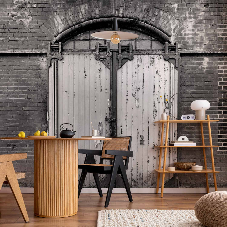 Wall Mural Door on brick - urban architecture in black and white style 89857 additionalImage 6
