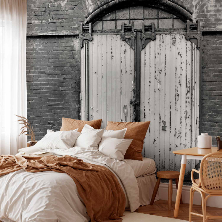 Wall Mural Door on brick - urban architecture in black and white style 89857 additionalImage 2