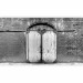 Wall Mural Door on brick - urban architecture in black and white style 89857 additionalThumb 1