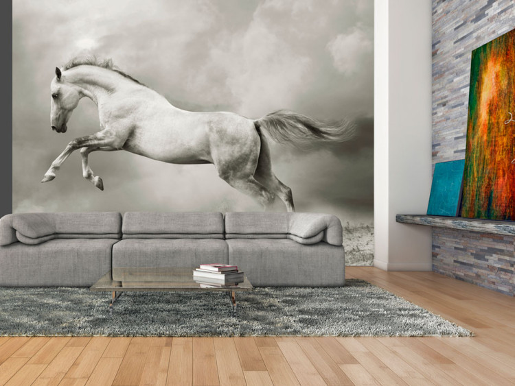 Photo Wallpaper Strong Stallion - White jumping horse on sand amidst thick gray smoke 61267