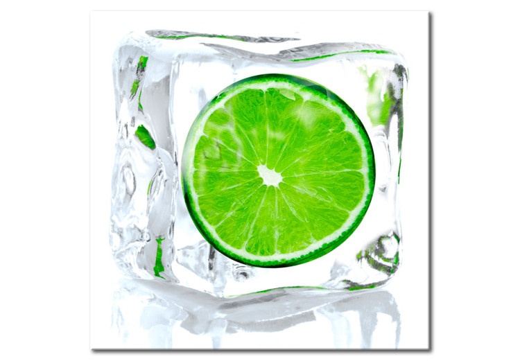 Canvas Frozen lime - still life depicting fruit frozen in ice ankle on a white background 58787