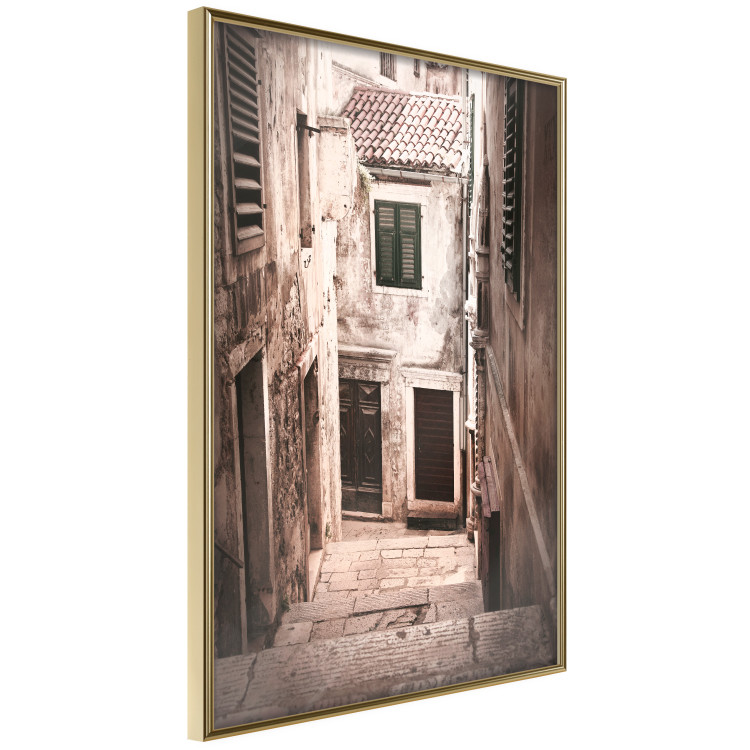 Poster Retro Alley - urban architecture of a stone alleyway in sepia tone 128608 additionalImage 12