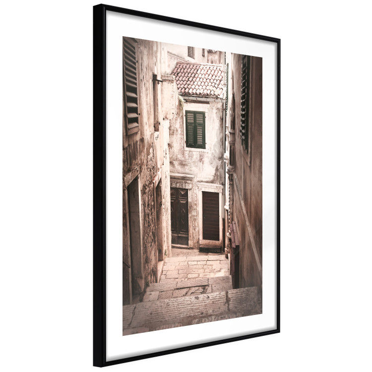 Poster Retro Alley - urban architecture of a stone alleyway in sepia tone 128608 additionalImage 11