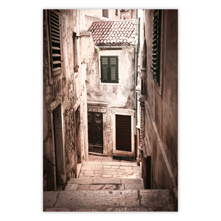 Poster Retro Alley - urban architecture of a stone alleyway in sepia tone 128608