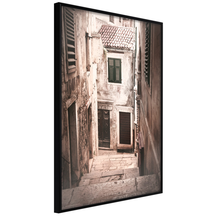 Poster Retro Alley - urban architecture of a stone alleyway in sepia tone 128608 additionalImage 10