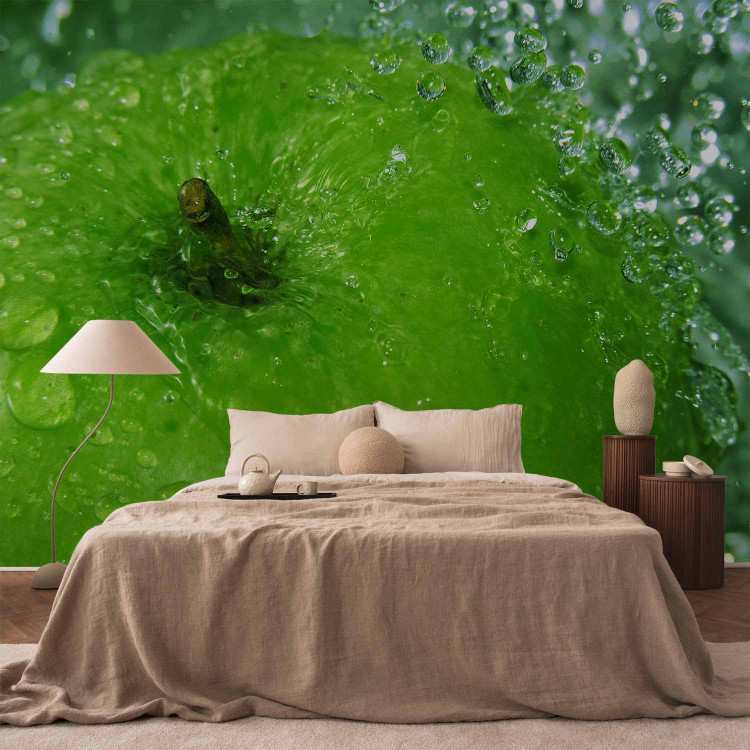 Photo Wallpaper Refreshing Flavours - Green Apple with Stem Dipping into Water 59818 additionalImage 2